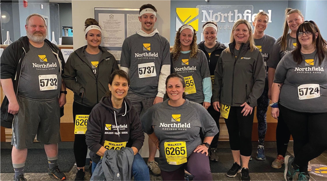 Team NSB poses for a photo at the Montpelier branch before participating in the Vermont Corporate Cup.