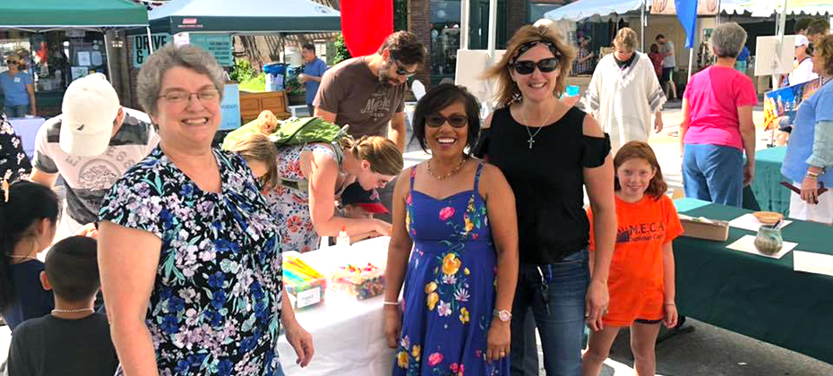 NSB Waterbury Community Bankers, Dixie Kenyon, Resma Towne, and Tammie Despault (left to right) volunteering at the NSB craft booth.