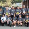 Team NSB poses for a group photo in front of the Montpelier branch before the Vermont Corporate Cup.