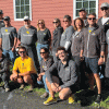 NSB employees pose for a photo at Camp Ta-Kum-Ta